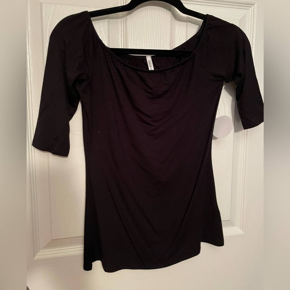 Lulus off the should spandex feeling shirt.